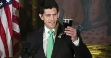  ?? AL DRAGO/THE NEW YORK TIMES ?? House Speaker and Irish American Paul Ryan had Irish people crying into their pints when he used a badly-poured, flat Guinness for his toast.