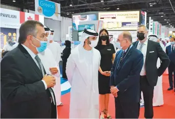  ?? WAM ?? Shaikh Mansour Bin Mohammad tours Big 5 after inaugurati­ng the event yesterday.