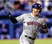  ?? Joshua Bessex / Associated Press ?? Shortstop Carlos Correa was 2 for 5 with two home runs, including this three-run homer in the eighth.