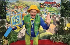  ?? BRADY MACDONALD — STAFF ?? Southern California News Group theme park reporter Brady MacDonald models mix-andmatch costume elements that employees in the reimagined Mickey’s Toontown will wear.