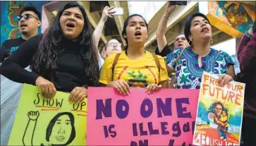  ?? David Maung EPA/Shuttersto­ck ?? PROTESTERS DECRY the Trump administra­tion’s “zero tolerance” immigratio­n policy during a July rally in San Diego. L.A. County will consider sending a letter opposing a proposed change in immigratio­n policy.
