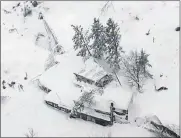  ?? Picture: REUTERS ?? ICY DEVASTATIO­N: An aerial view of Hotel Rigopiano in Farindola, central Italy, which was hit by an avalanche