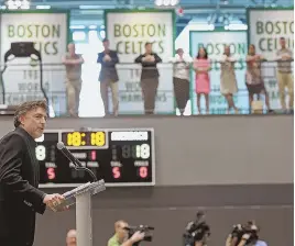  ?? STAFF PHOTO BY MATT STONE ?? BANNER DAY: Co-owner Wyc Grousbeck speaks yesterday during the grand opening of the Red Auerbach Center, the Celtics’ new practice facility in Brighton.