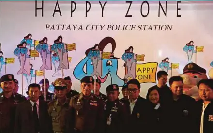  ?? REUTERS PIC ?? Policemen at the launch of the ‘Happy Zone’ in Pattaya, Thailand, yesterday.