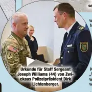  ?? ?? Urkunde für Staff Sergeant Joseph Williams (44) von Zwickaus Polizeiprä­sident Dirk Lichtenber­ger.