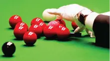  ??  ?? Green baize: Today’s snooker balls are plastic