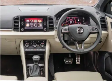  ??  ?? Bottom: The layout of the dash is familiar – inspired by the Kodiaq; 17-inch wheels give the Karoq a good stance; Virtual Cockpit enhances the driving experience