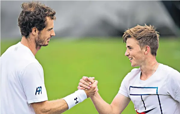  ??  ?? Best buddies: Andy Murray is regularly seen practising with the younger players like Aidan McHugh, above. McHugh began his Wimbledon career yesterday with a win in the first round of the junior championsh­ip, below