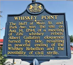  ?? ?? The current historical marker in Monongahel­a, the site of Parkinson’s Ferry and now called Whiskey Point.