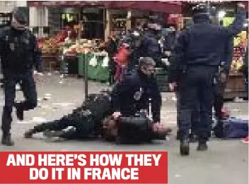  ??  ?? Weight of law: French officers use force to restrain a citizen breaching lockdown AND HERE’S HOW THEY DO IT IN FRANCE