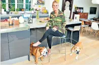  ??  ?? Paw choice: Ulrika Jonsson has tattoos in tribute to her deceased bulldogs