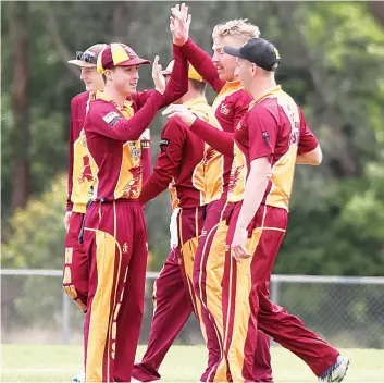  ?? ?? Drouin teammates celebrate after Mitch Goodwin claims the wicket of Western Park’s Sam Cheeseman.