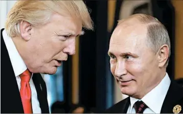  ?? MIKHAIL KLIMENTYEV/GETTY-AFP ?? President Donald Trump said he had “two or three very short conversati­ons” with Russia’s Vladimir Putin in Vietnam.