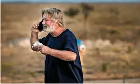  ?? Photograph: Jim Weber/The New Mexican ?? A distraught Alec Baldwin in the parking lot outside the Santa Fe county sheriff’s office. Baldwin said he was ‘fully cooperatin­g with the police investigat­ion to address how this tragedy occurred’.