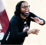  ??  ?? Mississipp­i State head women’s basketball coach Nikki Mccraypens­on gives instructio­ns to her players. (AP file photo)