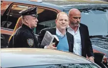  ?? ANDRES KUDACKI THE ASSOCIATED PRESS ?? Harvey Weinstein arrives at a police station in NYC to turn himself in to authoritie­s over numerous allegation­s of sexual misconduct.