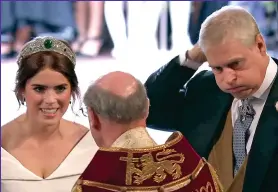  ??  ?? Keep smiling: Eugenie beams but her father is feeling the strain