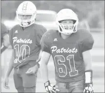  ?? Fred Conley • Times-Herald ?? Palestine-Wheatley Junior Patriot players Barrett Hobson (10) and Lane Westbrook (61) look to the sidelines for the play during a recent game. The Junior Patriots (1-1) shut out Clarendon 460 in a home game played Thursday night at Patriot Field.