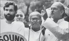  ?? HT PHOTO ?? VP Singh addressing a proMandal rally in New Delhi on 7 August, 1991. SR Bommai, Chandrajit Yadav and Ram Vilas Paswan are also in the picture.