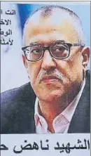  ?? MUHAMMAD HAMED / REUTERS ?? Una cartel de Nahad Hattar