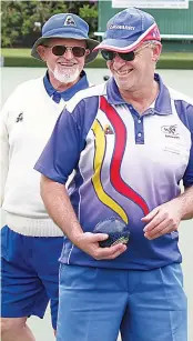  ?? ?? Above: Longwarry players John Majkut (left) and Russell White share a laugh during Saturday’s division two game at Drouin.
Longwarry won 92/52.