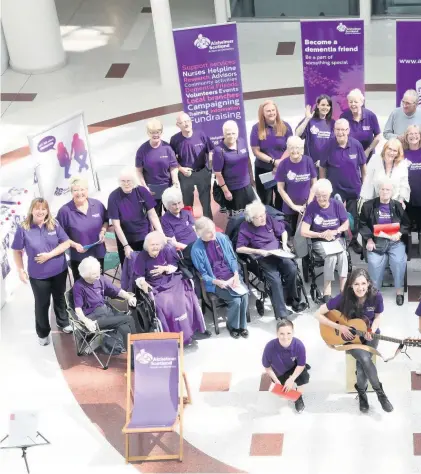  ??  ?? Raising awareness The event at intu Braehead was a great success during Dementia Awareness Week Scotland, and inset, a show of hands