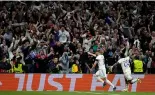  ?? ?? Real Madrid's Karim Benzema, left, celebrates his side's third goal during the Champions League semi final, second leg, match between Real Madrid and Manchester City Credit: AP Photo