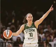  ?? Sam Morris / Associated Press ?? Seattle Storm guard Sue Bird directs teammates during a game against the Las Vegas Aces on Aug. 14. When opponents and teammates alike read off the skills that have separated Bird into being one of the best, her mind and the way she sees the game is at the top of the list. That skill of being a coach on the court will be tested when the fourth-seeded Storm face No. 1 seed Las Vegas in the WNBA semifinals.