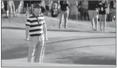  ?? AP/JULIO CORTEZ ?? Kevin Kisner watches his putt on the 18th hole during the Presidents Cup foursomes at Liberty National Golf Club in Jersey City, N.J. on Thursday.