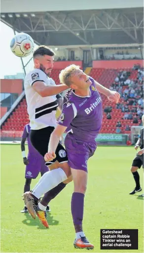  ??  ?? Gateshead captain Robbie Tinkler wins an aerial challenge