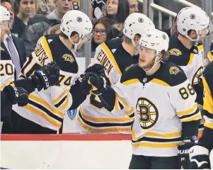  ?? AP PHoTo ?? PLENTY TO CELEBRATE: David Pastrnak shares the Bruins lead with 17 goals this season.