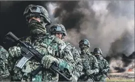  ?? David Guzman EPA/Shuttersto­ck ?? MARINES in Acapulco participat­e in the destructio­n of cocaine and marijuana in September. Any move toward legalizati­on is a radical shift for Mexico.