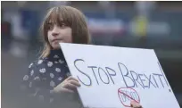  ??  ?? A GIRL participat­es in an anti-Brexit demonstrat­ion at City Hall in central Belfast, Northern Ireland in this Oct. 20 photo.