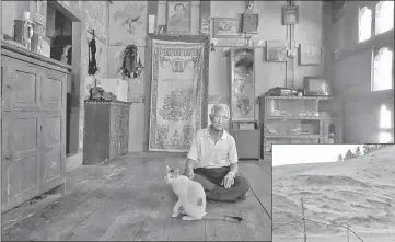  ??  ?? Zeko, 73, poses for a portrait at his home in Punakha. “I’m happy to have a mobile phone so I can talk to my relatives and children any time I want,” Zeko said.