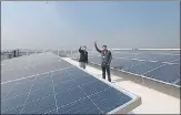  ?? ARVIND YADAV/HT PHOTO ?? Solar panels installed atop the multi-storied flats for MPS at BD Marg in November 2020.