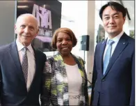  ??  ?? Former Little Rock mayors Jim Dailey and Lottie Shackelfor­d with Mayor Kim Sang Ho of Hanam City, South Korea, at the masters induction ceremony