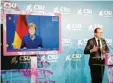  ?? Foto: dpa ?? Zwar nur digital vereint, aber inhaltlich wieder nah: Angela Merkel (CDU) und Alexander Dobrindt (CSU).