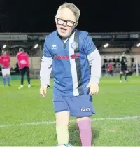  ??  ?? ●●Harry on the pitch before the match