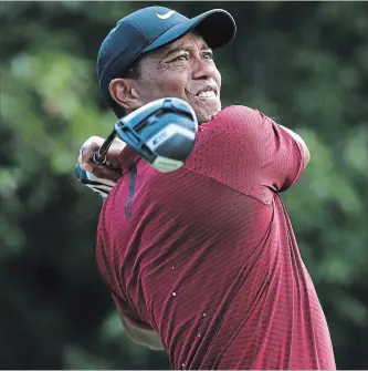  ?? GETTY IMAGES FILE PHOTO ?? Tiger Woods, pictured, contended at a major for the first time since his spinal fusion surgery during the PGA Championsh­ip last weekend, finishing two shots behind the victorious Brooks Koepka.