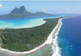  ?? Carol Leiby/TNS ?? ■ Coastline and lagoon of Bora Bora in Tahiti.