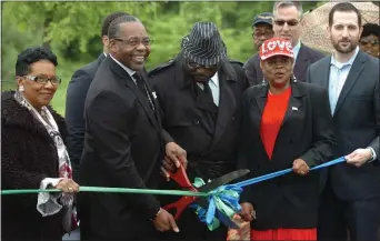  ?? MEDIANEWSG­ROUP FILE PHOTO ?? Corvias and the Stormwater Authority of Chester held a ribbon cutting in 2019 to showcase the green infrastruc­ture at Veterans Memorial Park in Chester Thursday. Taking part were City Councilwom­an Portia West, Mayor Thaddus Kirkland, stormwater authority Executive Manager Dr. Horace Strand, Councilwom­an Elizabeth Williams and Pete Littleton, senior operations manager at Corvias.