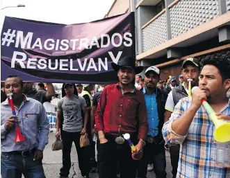  ?? JOHAN ORDONEZ/AFP/GETTY IMAGES ?? Protesters gather at San Rafael, the Guatemalan branch of Tahoe Resources, in March. The Vancouver-based firm is expected to restart its La Arena gold mine in Peru after protests there.