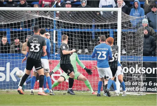  ?? Pete Norton ?? Callum Morton scores the winning goal for Northampto­n at the Moss Rose on Saturday