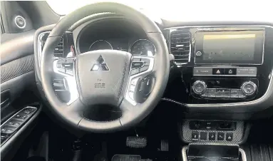  ??  ?? Everything you would want in a modern automobile is inside the 2019 Mitsubishi Outlander PHEV.