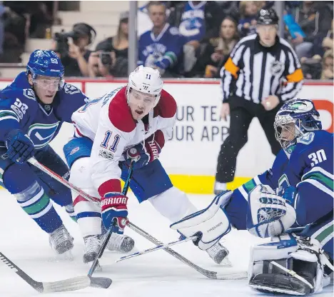  ?? GERRY KAHRMANN ?? It’s not enough just to score goals when you’re an NHL team’s No. 1 centre. Just ask emerging star Bo Horvat of the Canucks, whose new job descriptio­n also requires him to defend against other top players, including Brendan Gallagher of the Canadiens.