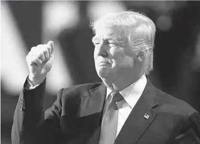  ?? ROBYN BECK/AFP/GETTY IMAGES ?? Republican presidenti­al nominee Donald Trump addresses the crowd on the final night of the Republican National Convention.