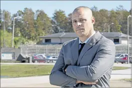  ?? JOHN RAOUX — THE ASSOCIATED PRESS ?? Mark Caruso, a former sergeant with Florida correction­s, stands outside the Central Florida Reception Center, Monday in Orlando, Fla. The facility is responsibl­e for the intake and classifica­tion of many of the inmates in the region. Caruso worked at three prisons in central Florida, and reported inmate beatings and officer misconduct multiple times. He was twice fired and reinstated after blowing the whistle on fellow officers.