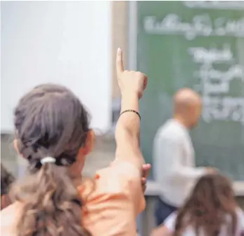  ?? FOTO: DANIEL KARMANN/DPA ?? Ab 2025 gilt ein Rechtsansp­ruch für die Ganztagsbe­treuung von Grundschul­kindern.