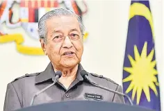  ??  ?? On the ECRL’s ticket prices, Dr Mahathir said the details had not been worked out yet. — Bernama photo