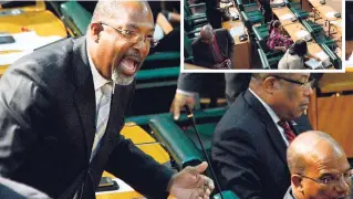  ??  ?? BELOW: Opposition People’s National Party Member of Parliament Luther Buchanan starts an uproar before the walkout. ‘COWARDS!’